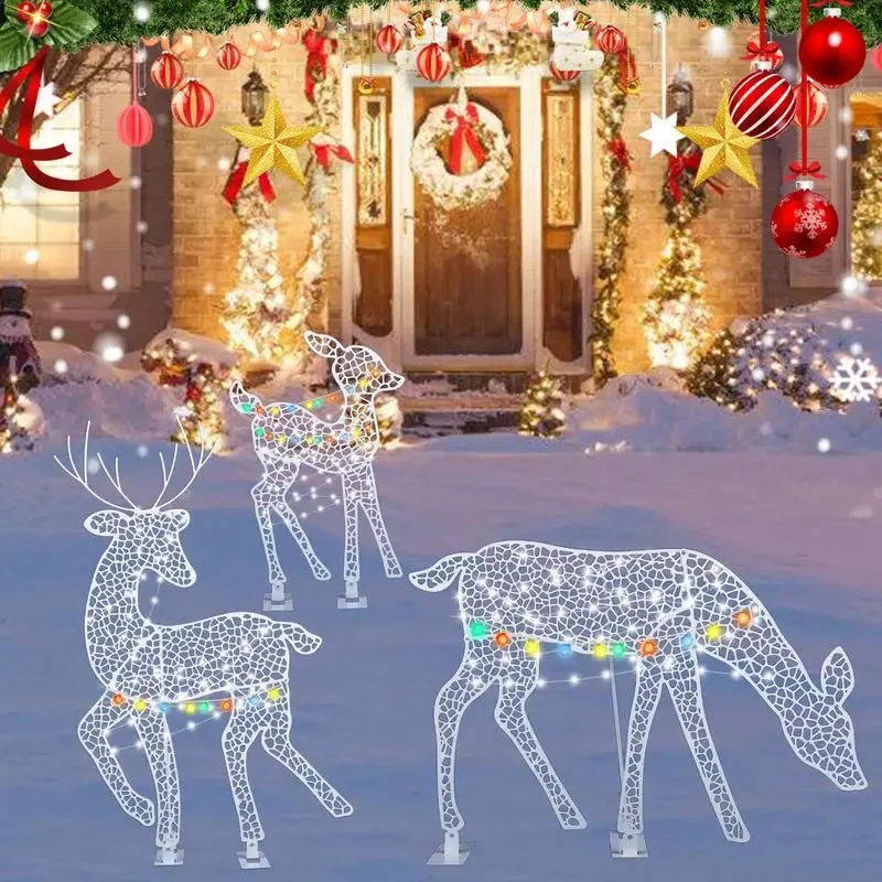 Renne de Noël Lumineux en soirée