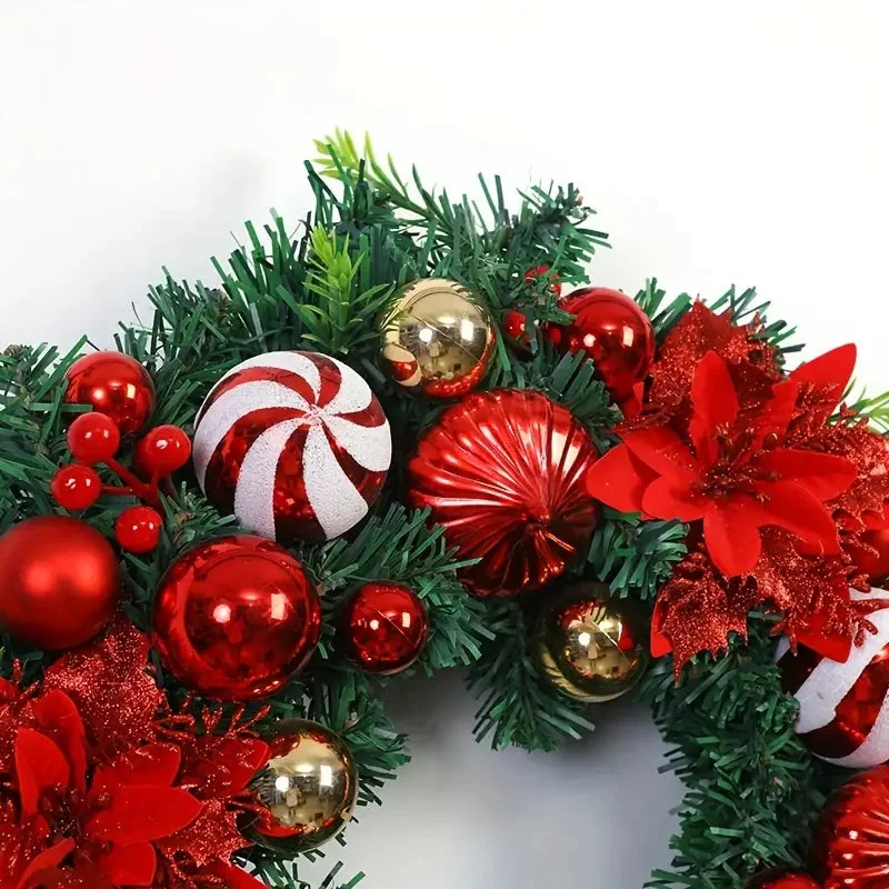 Couronne de Noël avec baies rouges et feuillage synthétique
